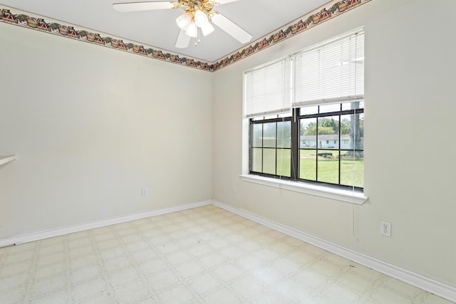 spare room featuring ceiling fan