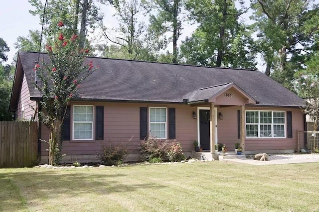 ranch-style house featuring a front lawn