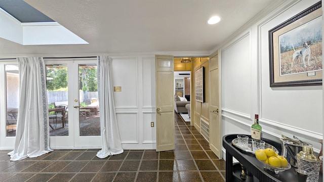 880 Goodhue Rd, Beaumont, TX 77706 - foyer with a decorative wall, french doors, and recessed lighting