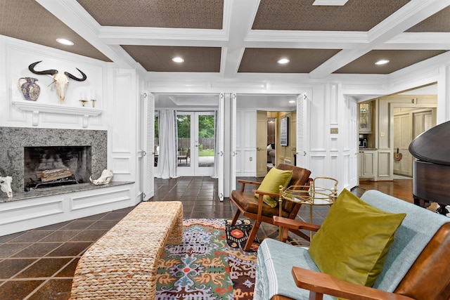 880 Goodhue Rd, Beaumont, TX 77706 - living room featuring crown molding, a decorative wall, coffered ceiling, recessed lighting, and a premium fireplace