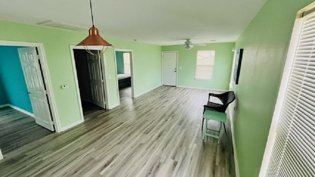 interior space featuring ceiling fan and light hardwood / wood-style floors