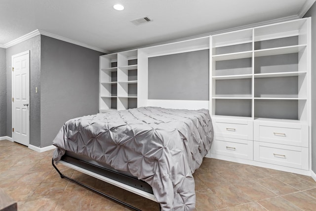 bedroom featuring crown molding