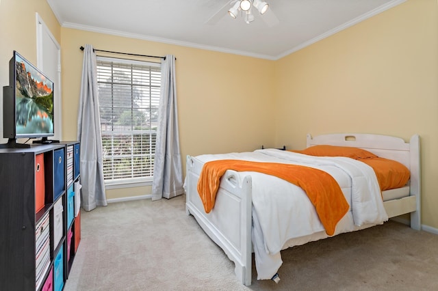 carpeted bedroom with ceiling fan, crown molding, and multiple windows