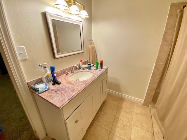 bathroom featuring tile patterned floors and vanity