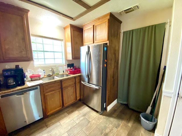 kitchen with sink and stainless steel appliances