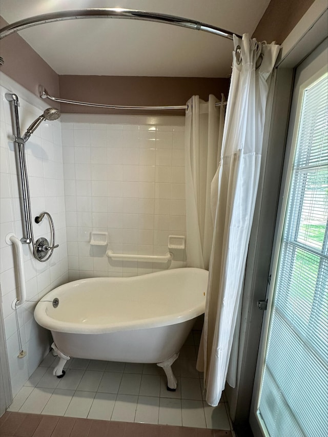 2316 Manley Cir, Orange, TX 77630 - bathroom with tile patterned flooring and shower / bath combination with curtain