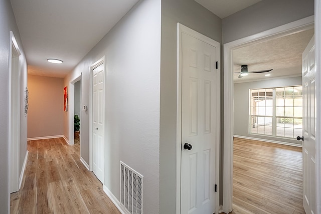 hall featuring light wood-type flooring