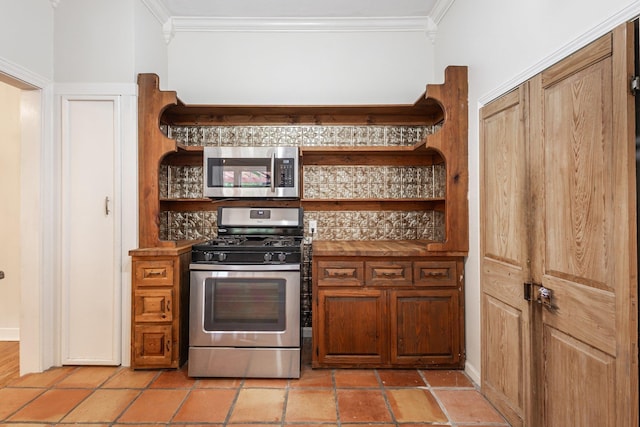 kitchen with open shelves, appliances with stainless steel finishes, and crown molding