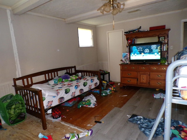3100 Boyd Ave, Groves, TX 77619 - bedroom featuring beamed ceiling and wood finished floors