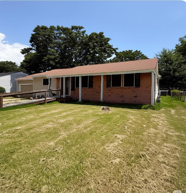 3100 Boyd Ave, Groves, TX 77619 - ranch-style house featuring a front yard