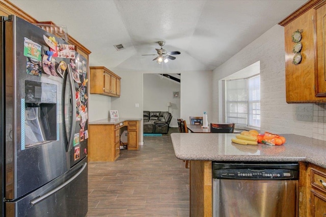 kitchen with decorative backsplash, ceiling fan, dark hardwood / wood-style flooring, and appliances with stainless steel finishes