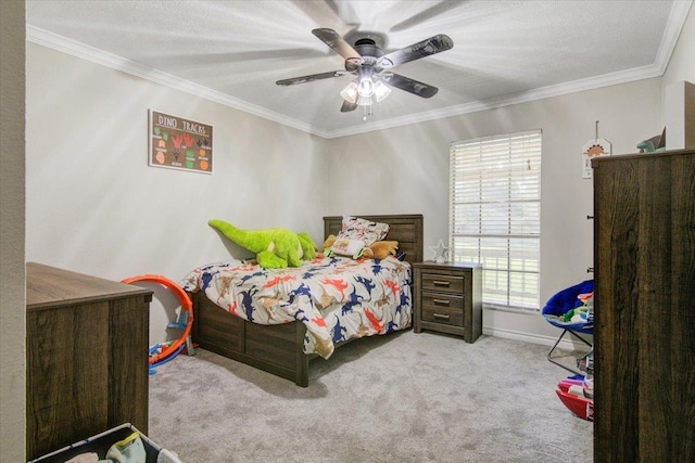 bedroom featuring ceiling fan, crown molding, and light carpet