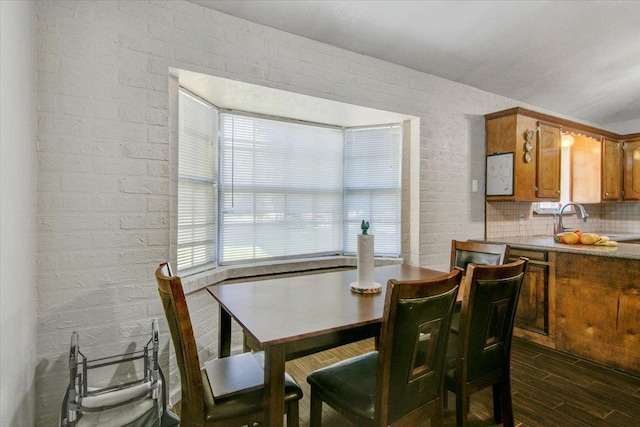 dining room with plenty of natural light and sink