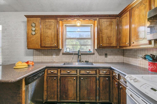 kitchen featuring decorative backsplash, dishwasher, and sink