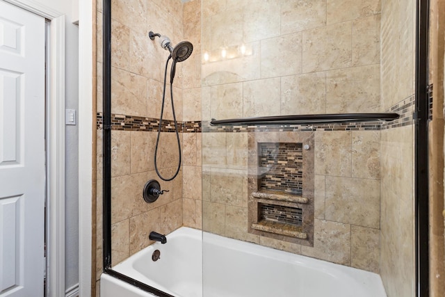 bathroom featuring tiled shower / bath combo