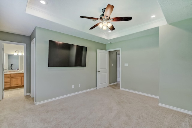 6640 Palace Dr, Lumberton, TX 77657 - unfurnished bedroom with a tray ceiling, light colored carpet, ornamental molding, and recessed lighting
