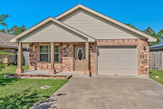 6640 Palace Dr, Lumberton, TX 77657 - single story home with brick siding, an attached garage, fence, and concrete driveway