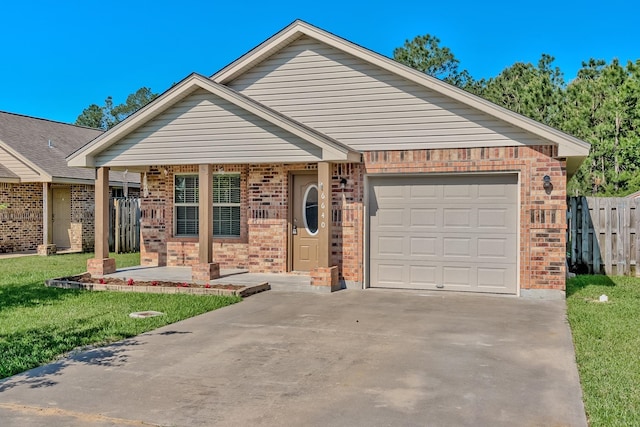 6640 Palace Dr, Lumberton, TX 77657 - ranch-style home with a front yard, an attached garage, fence, concrete driveway, and brick siding