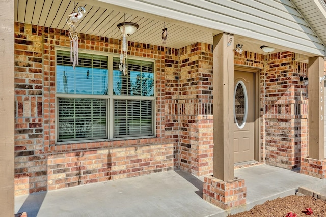 6640 Palace Dr, Lumberton, TX 77657 - doorway to property featuring brick siding