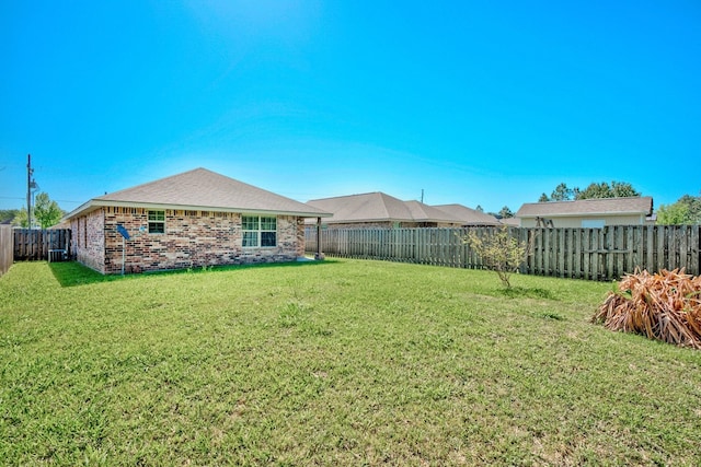 6640 Palace Dr, Lumberton, TX 77657 - view of yard with a fenced backyard
