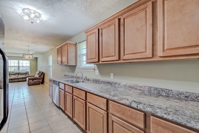 6640 Palace Dr, Lumberton, TX 77657 - kitchen featuring light tile patterned floors, a sink, open floor plan, a chandelier, and stainless steel dishwasher