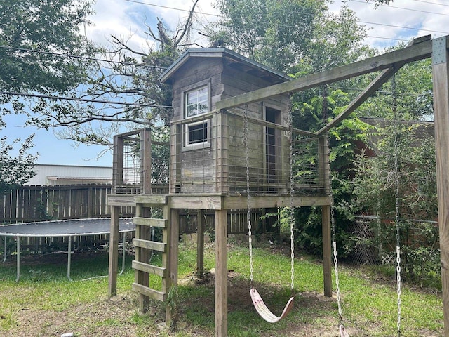 1009 Arthur St, Bridge City, TX 77611 - view of outdoor structure with a trampoline