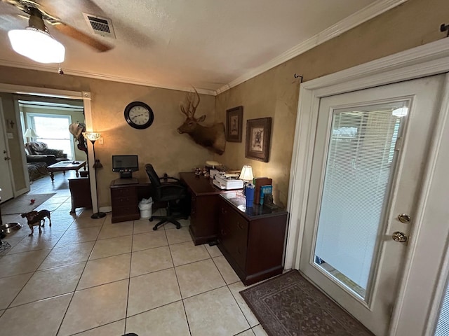 1009 Arthur St, Bridge City, TX 77611 - office with crown molding, light tile patterned flooring, and a ceiling fan