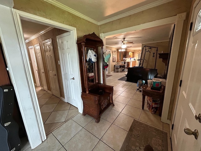 1009 Arthur St, Bridge City, TX 77611 - corridor with crown molding and light tile patterned floors