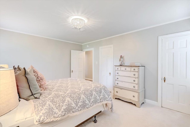 carpeted bedroom featuring ornamental molding