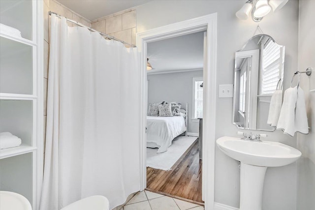 bathroom featuring tile patterned floors and sink