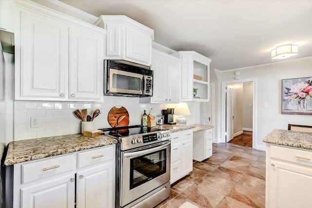 kitchen featuring light stone countertops, appliances with stainless steel finishes, backsplash, crown molding, and white cabinets