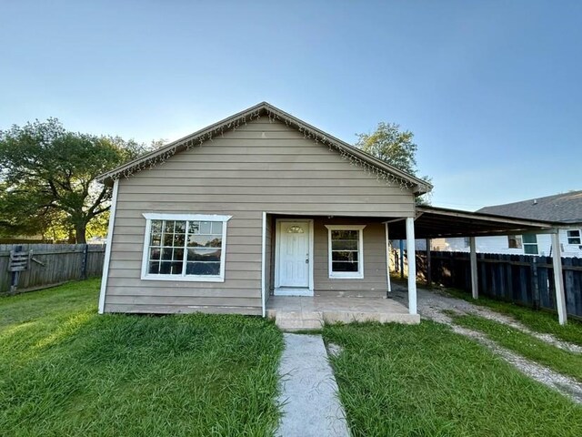 1235 13th St, Street, Port Arthur, TX 77640 - view of front of property featuring a patio