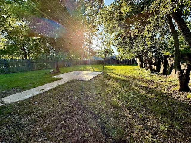 1235 13th St, Street, Port Arthur, TX 77640 - view of yard featuring a patio area