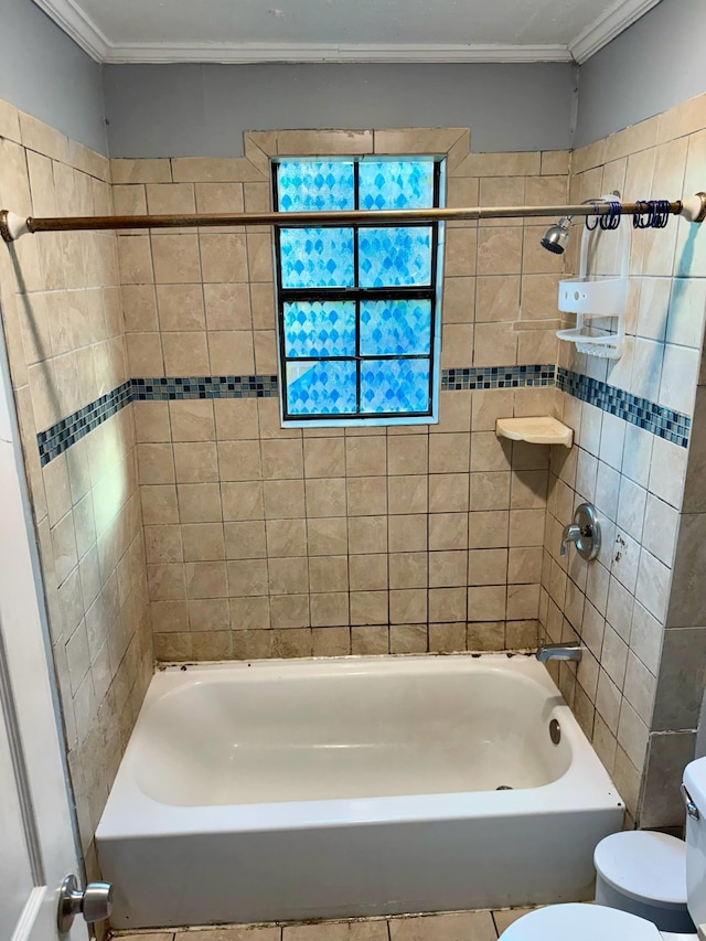 1235 13th St, Street, Port Arthur, TX 77640 - bathroom with crown molding, toilet, and bathing tub / shower combination