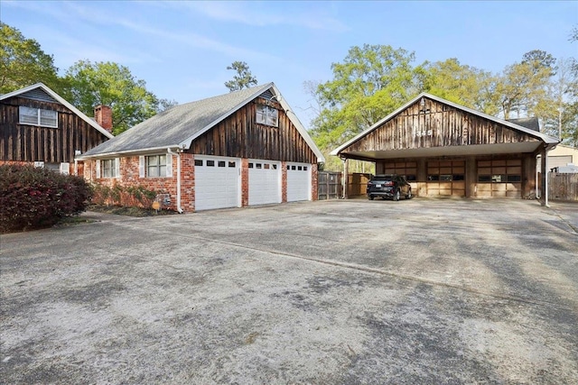 345 Mayhaw Dr, Vidor, TX 77662 - garage featuring a detached garage