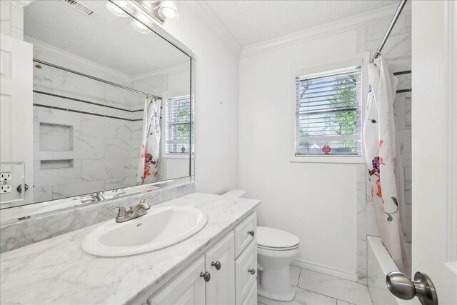 345 Mayhaw Dr, Vidor, TX 77662 - full bath with a textured ceiling, visible vents, crown molding, marble finish floor, and toilet