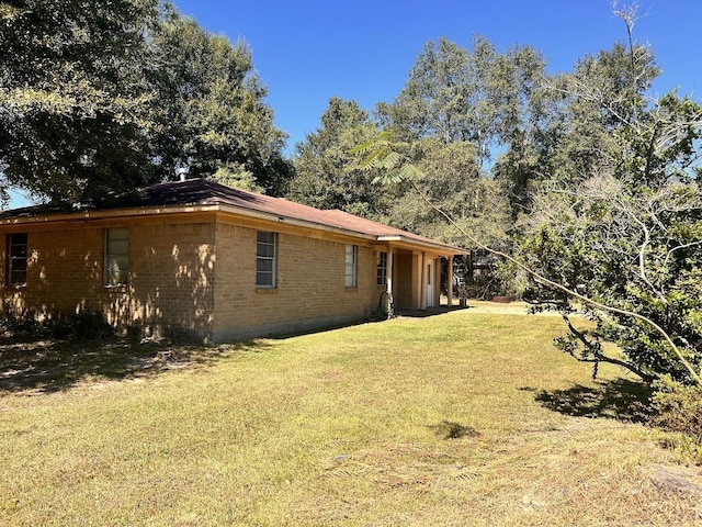 exterior space with a lawn