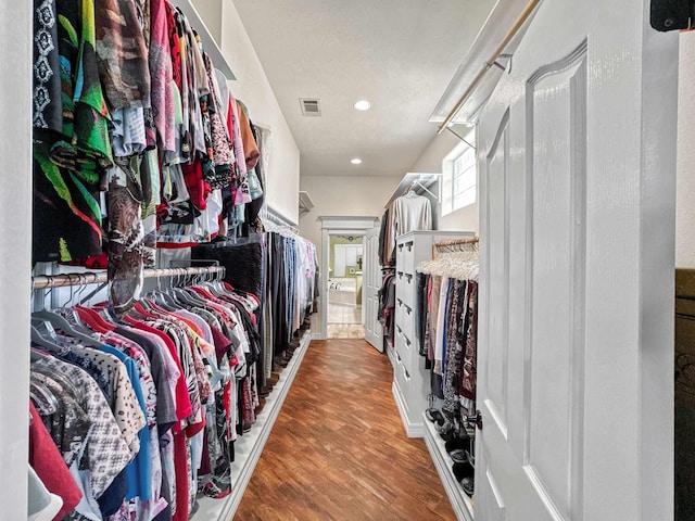 2460 W Norman Cir, Orange, TX 77630 - walk in closet featuring wood finished floors