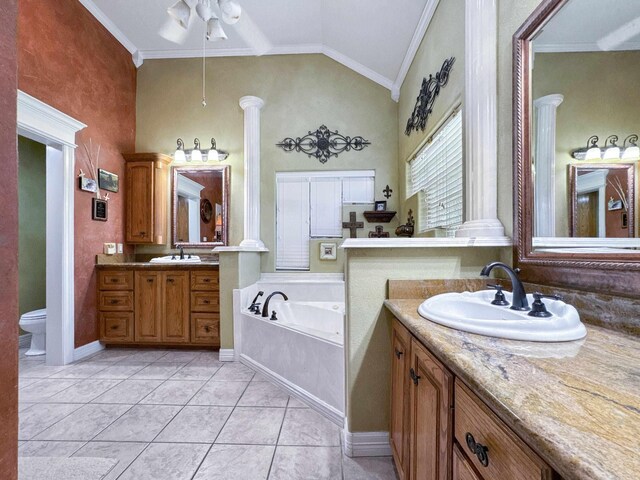 2460 W Norman Cir, Orange, TX 77630 - bathroom with two vanities, a bath, ceiling fan, high vaulted ceiling, and ornamental molding