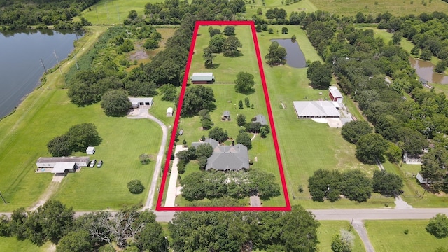 2460 W Norman Cir, Orange, TX 77630 - aerial overview of property's location with a large body of water and property parcel outlined