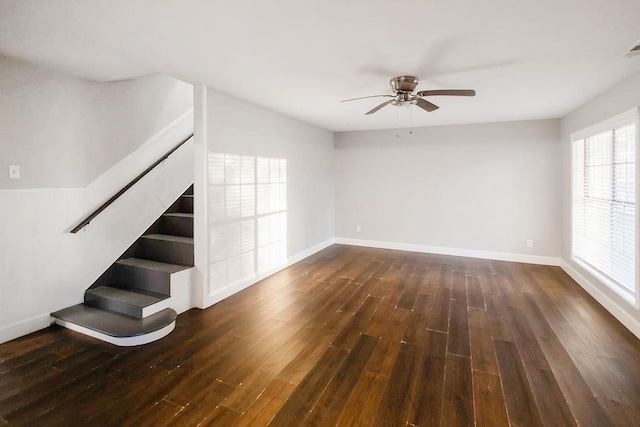 spare room with ceiling fan and dark hardwood / wood-style floors