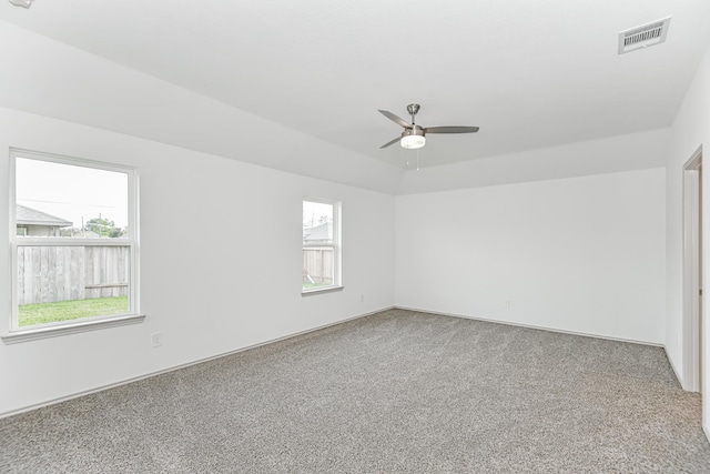 spare room with carpet and ceiling fan