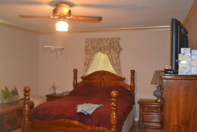 bedroom featuring ceiling fan and crown molding