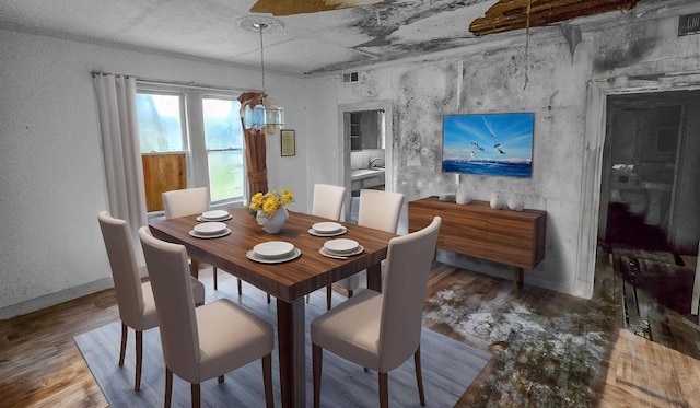 dining room featuring hardwood / wood-style floors