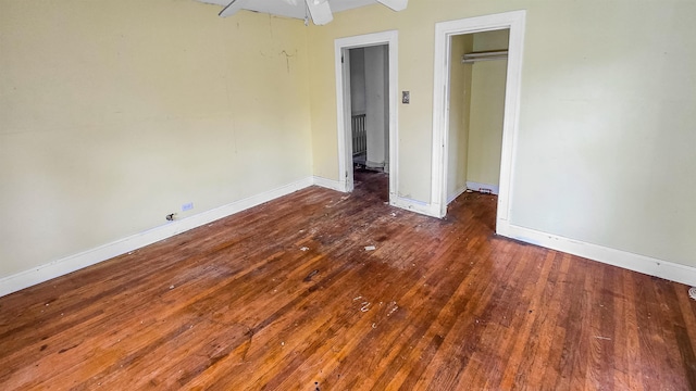 unfurnished bedroom with dark hardwood / wood-style floors