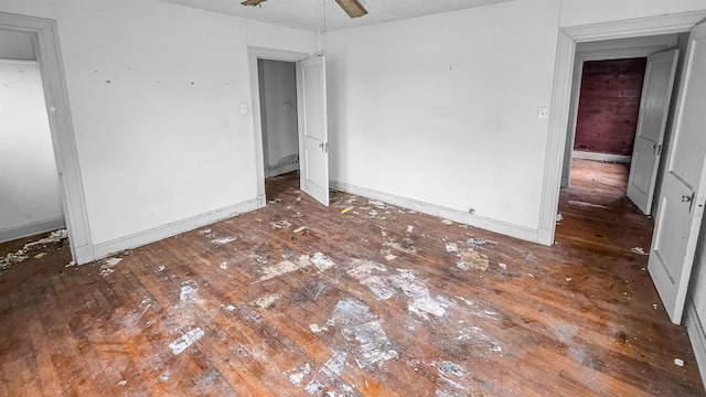 unfurnished bedroom featuring dark hardwood / wood-style floors