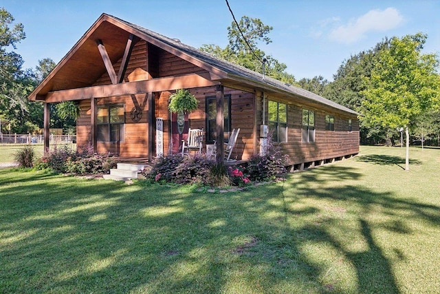 view of home's exterior featuring a lawn