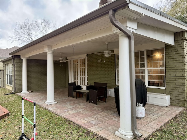 view of patio / terrace featuring a grill, ceiling fan, and outdoor lounge area