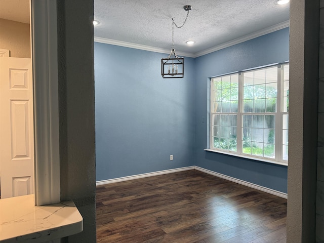5835 Calder Ave, Beaumont, TX 77706 - spare room featuring a textured ceiling, dark wood finished floors, crown molding, a chandelier, and baseboards