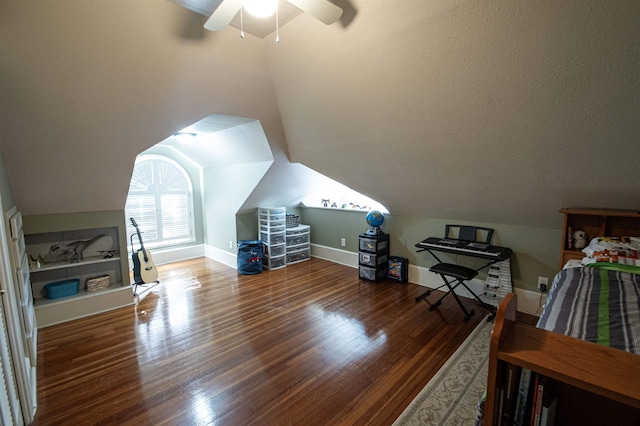 additional living space with hardwood / wood-style flooring, ceiling fan, and lofted ceiling